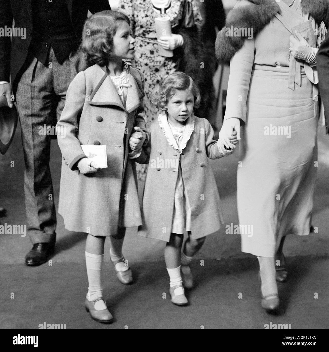 File photo dated 26/06/1934 of The Duchess of York, with Princess Elizabeth (now Queen Elizabeth II) and Princess Margaret, arriving at Olympia for the International Horse show. Issue date: Sunday September 18, 2022.. Photo credit should read: PA Wire Stock Photo