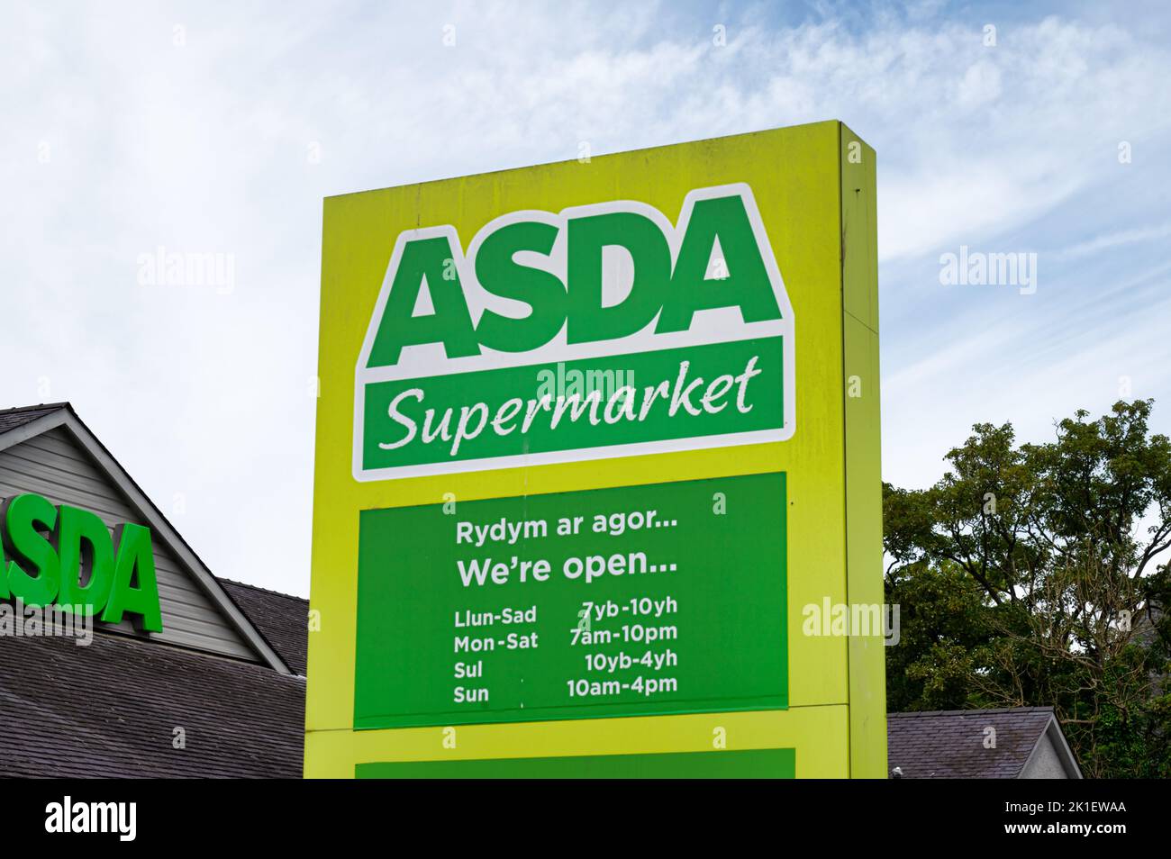Caernarfon, UK- July 11, 2022:  Asda supermarket sign in Caernarfon in North Wales. Stock Photo