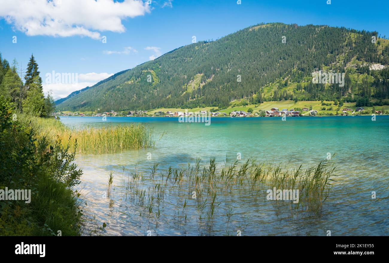 Weissensee in the Carinthia region. Panorama view to the famous lake in the South of Austria during summer. Stock Photo