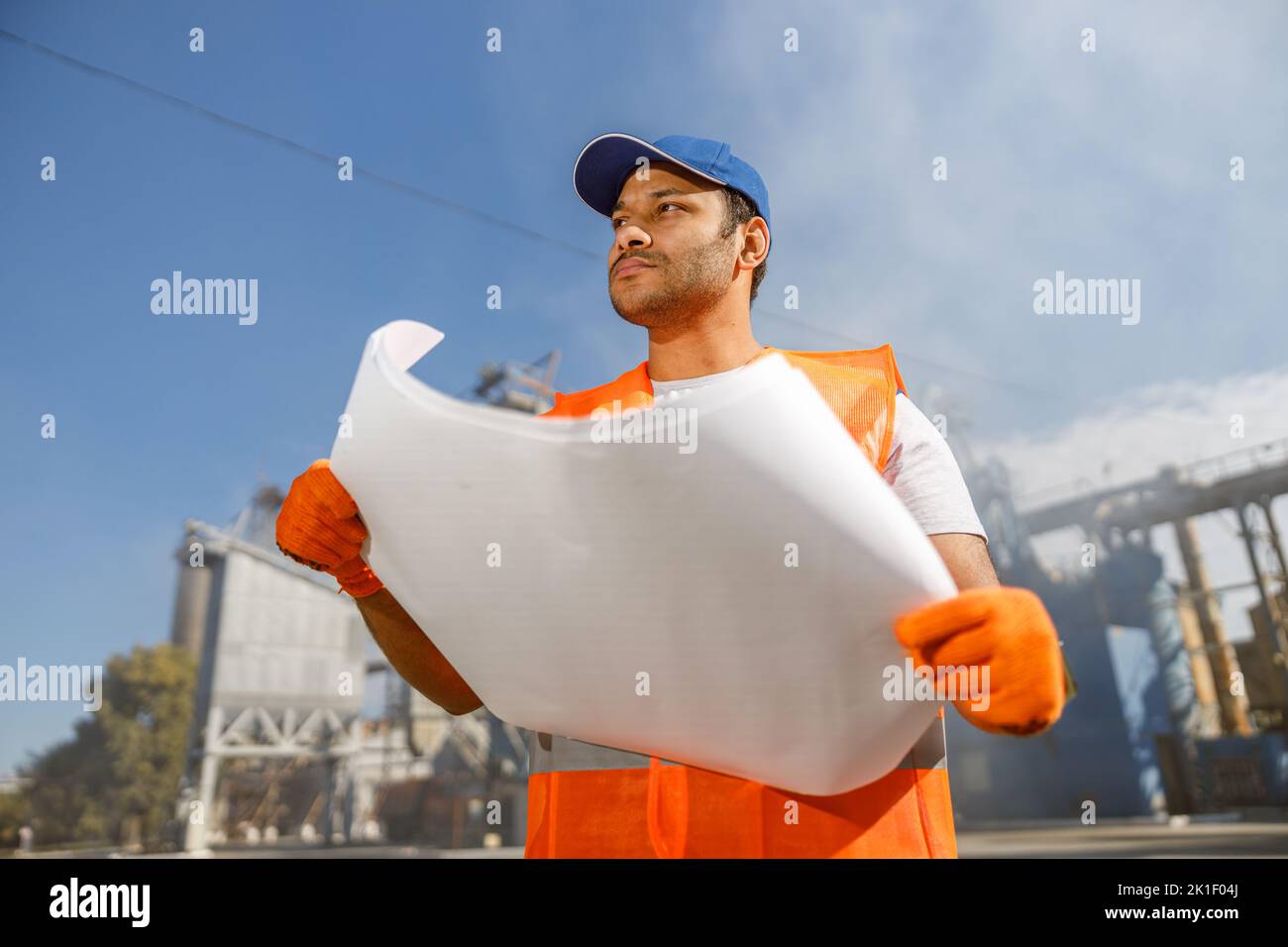 Young foreman working at construction material factory Stock Photo