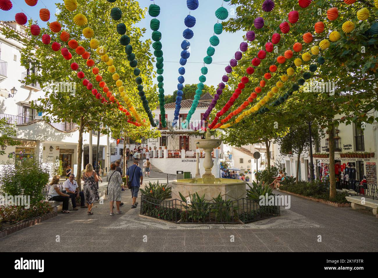 Decorated white washed village of Mijas pueblo, during festivities, Andalusia, Malaga province, Costa del sol, Spain Stock Photo