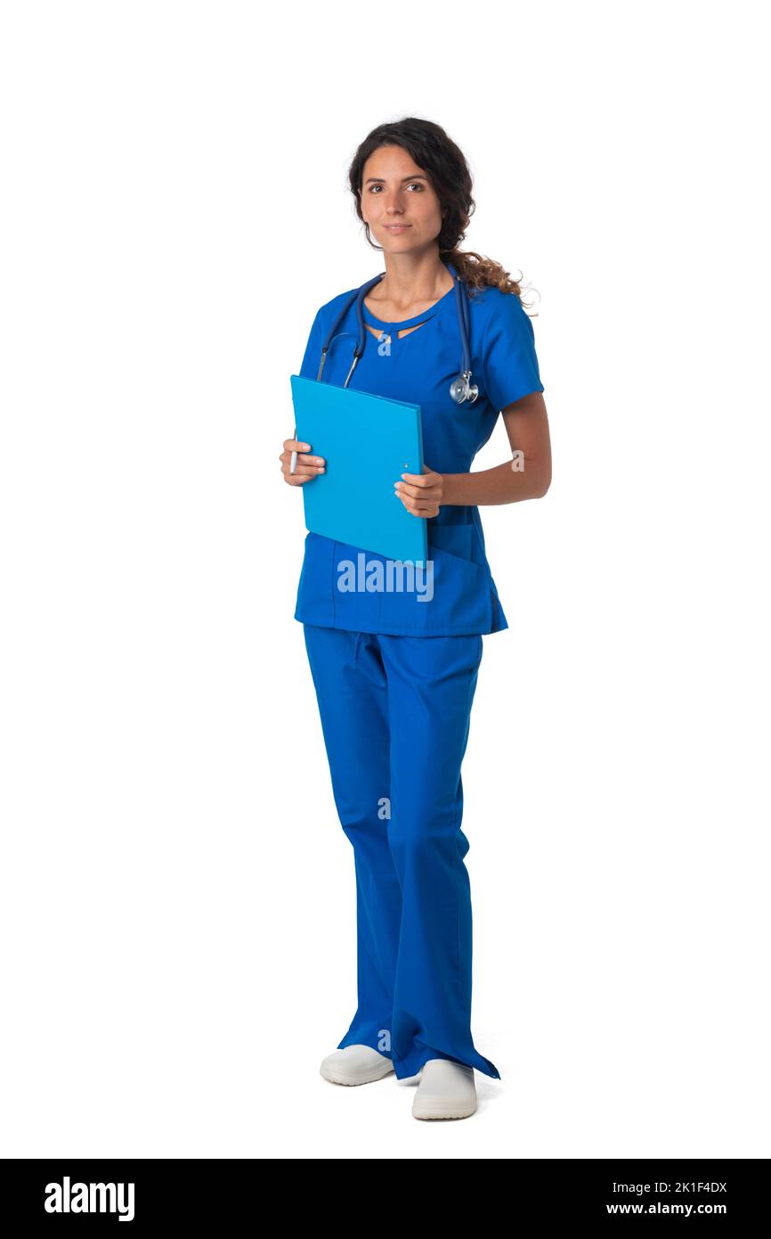 Female nurse in blue uniform with stethoscope and document folder isolated on white background, full length portrait Stock Photo