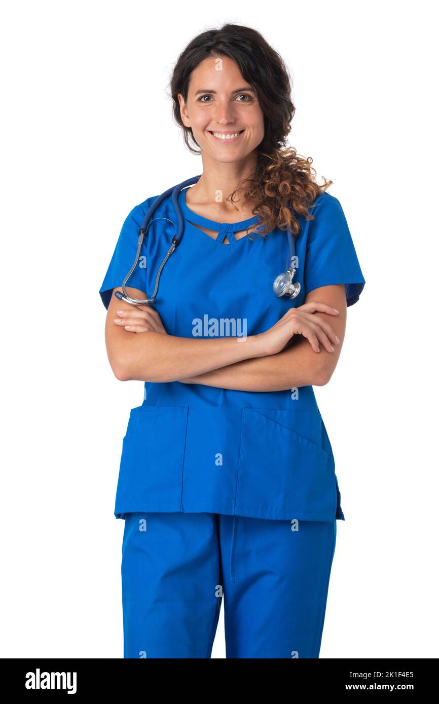 Female nurse in blue uniform with stethoscope standing with arms crossed isolated on white background Stock Photo