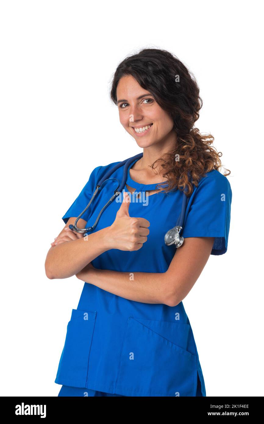 Smiling woman doctor or nurse with thumb up, studio portrait isolated on white background Stock Photo