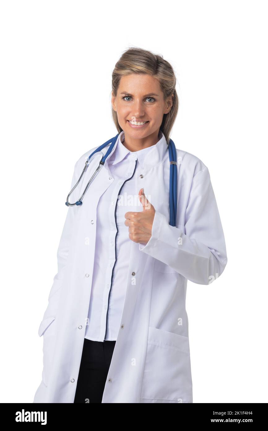 Portrait of female medical doctor with stethoscope standing and smiling isolated on white background Stock Photo