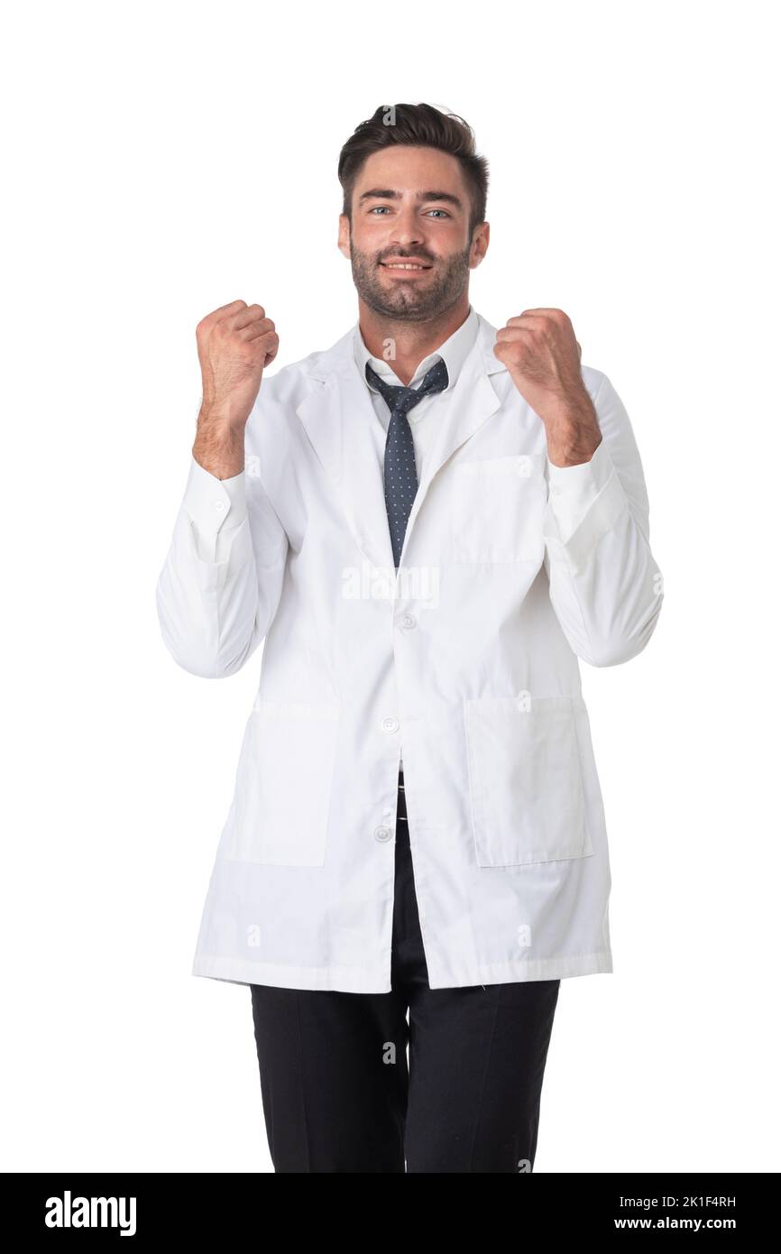 Portrait of doctor man holding fist success sign isolated on white background Stock Photo