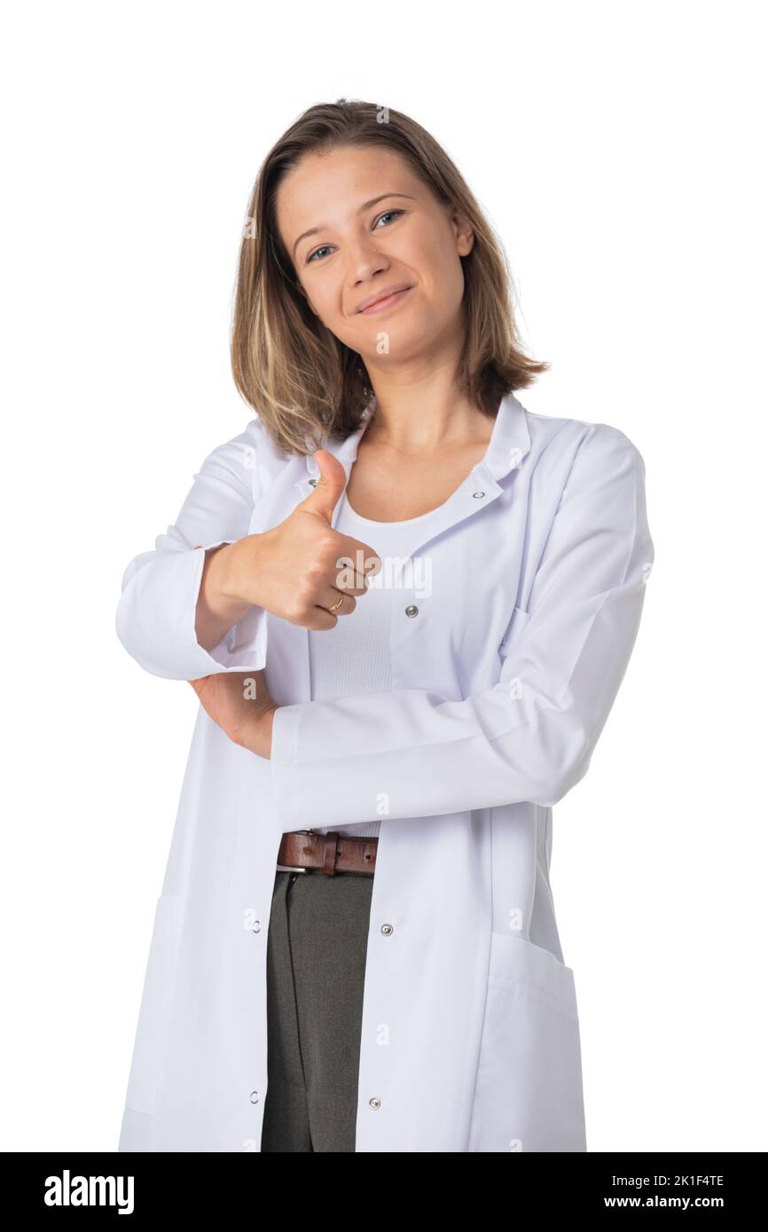 Portrait of female medical doctor showing thumb up and smiling isolated on white background Stock Photo