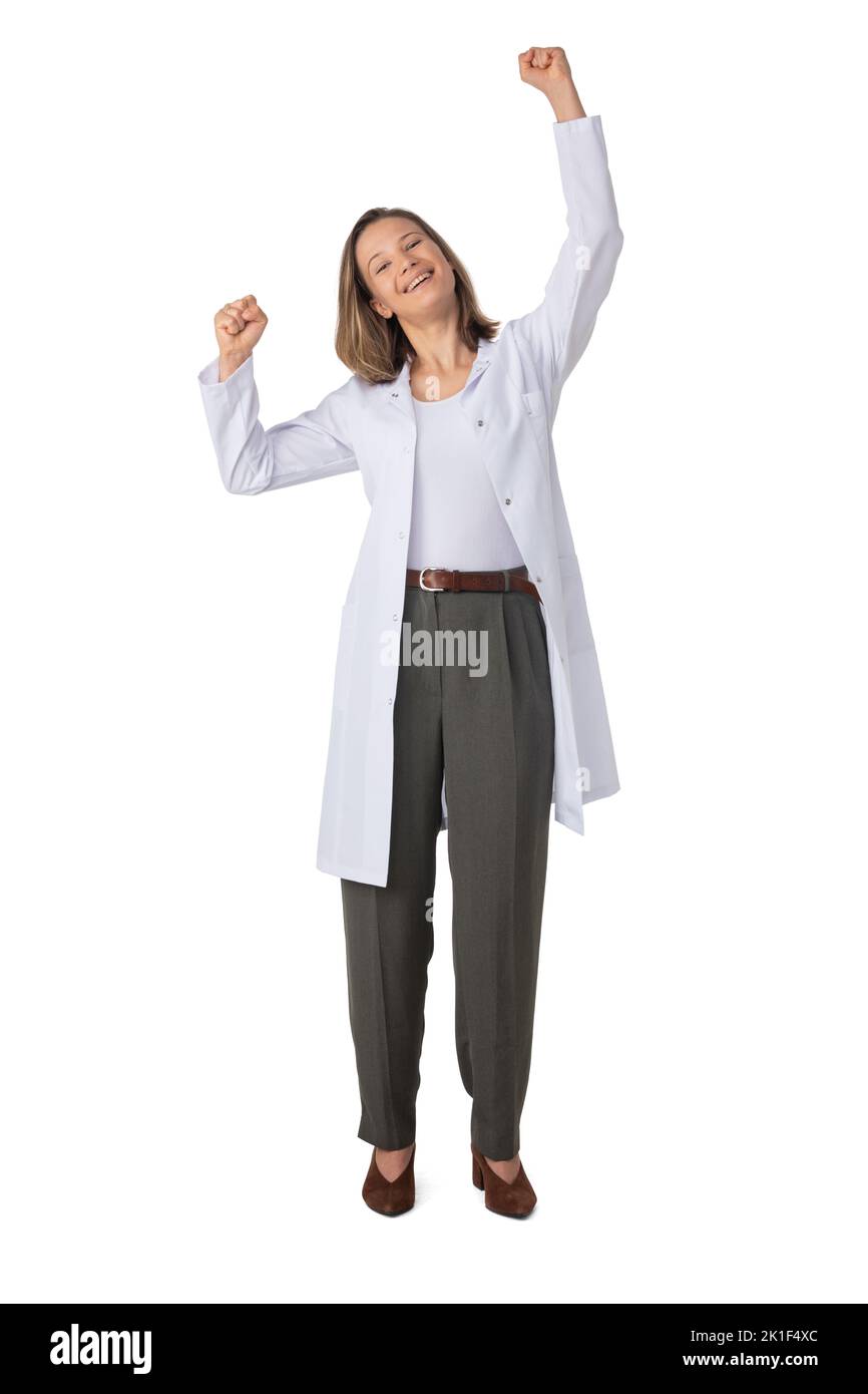 Young female medical doctor with stethoscope with raised arms isolated on white background full length studio portrait Stock Photo