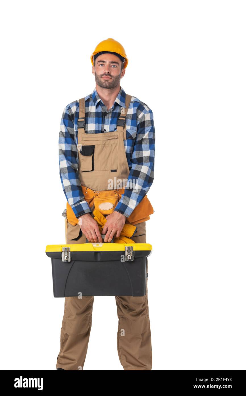 Contractor worker in coveralls and yellow hardhat with toolbox isolated on white background Stock Photo