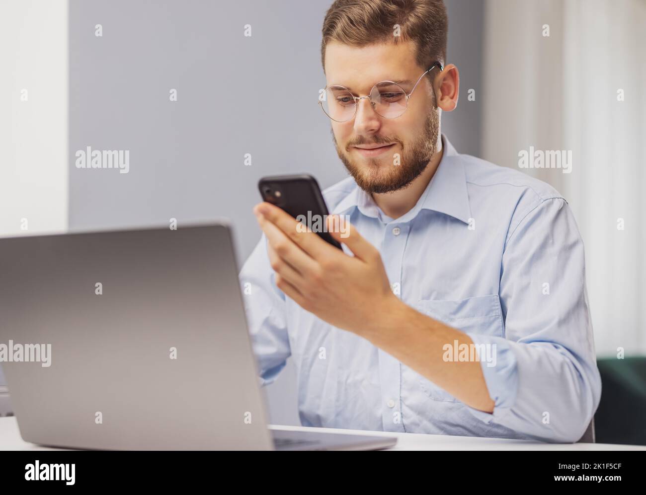 Man using smartphone Stock Photo