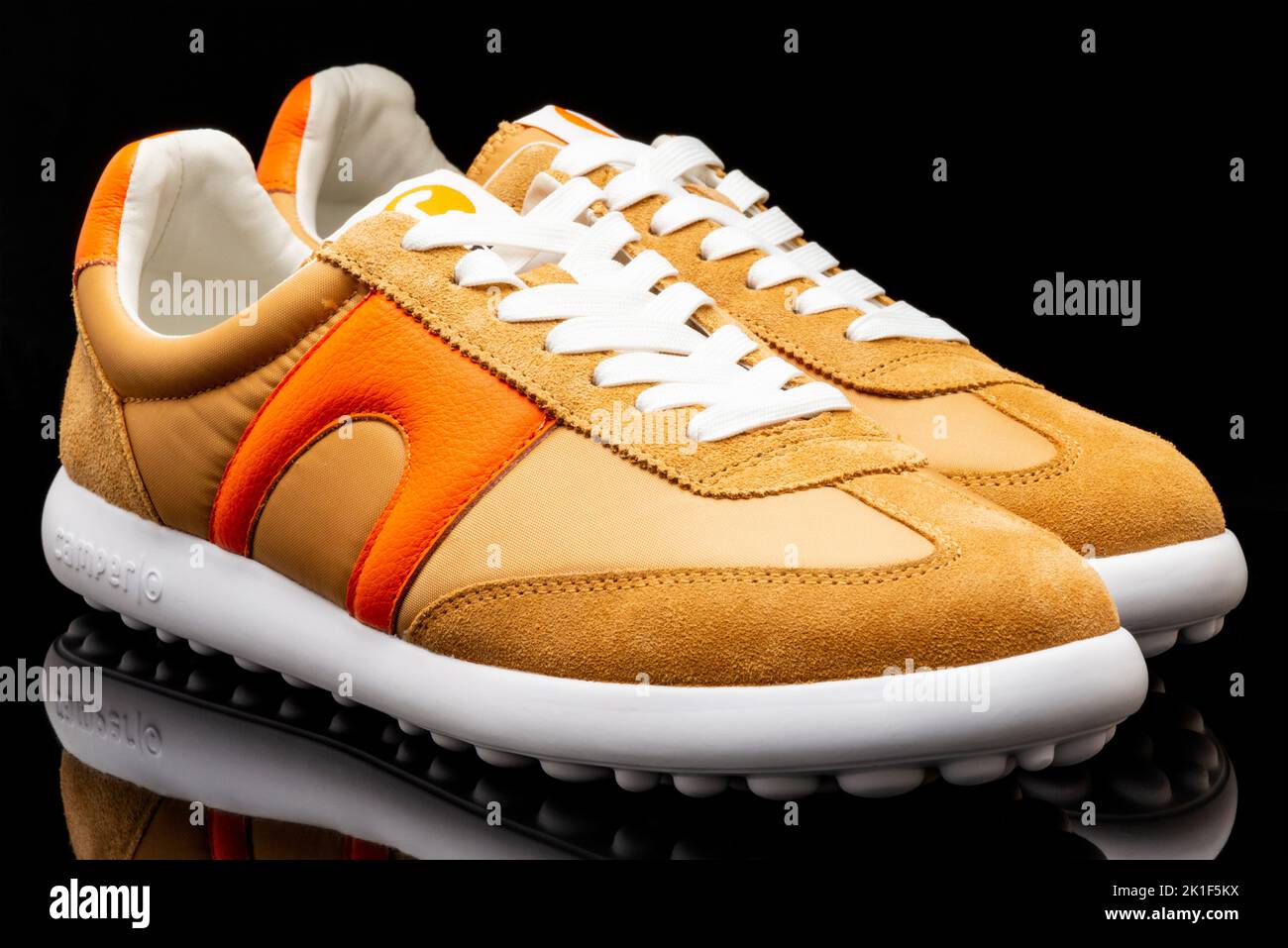 Camper shoes. Camper logo and label on vintage trainers and casual urban  shoes Stock Photo - Alamy