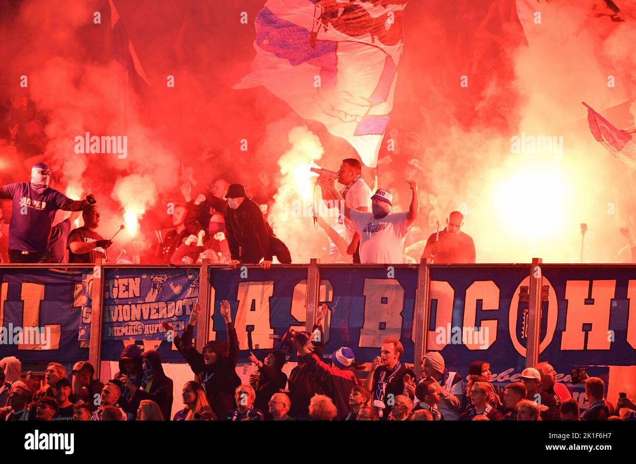 Bundesliga, Veltins Arena, FC Schalke 04 vs VfL Bochum; Bochum fans ignite pyrotechnics Stock Photo