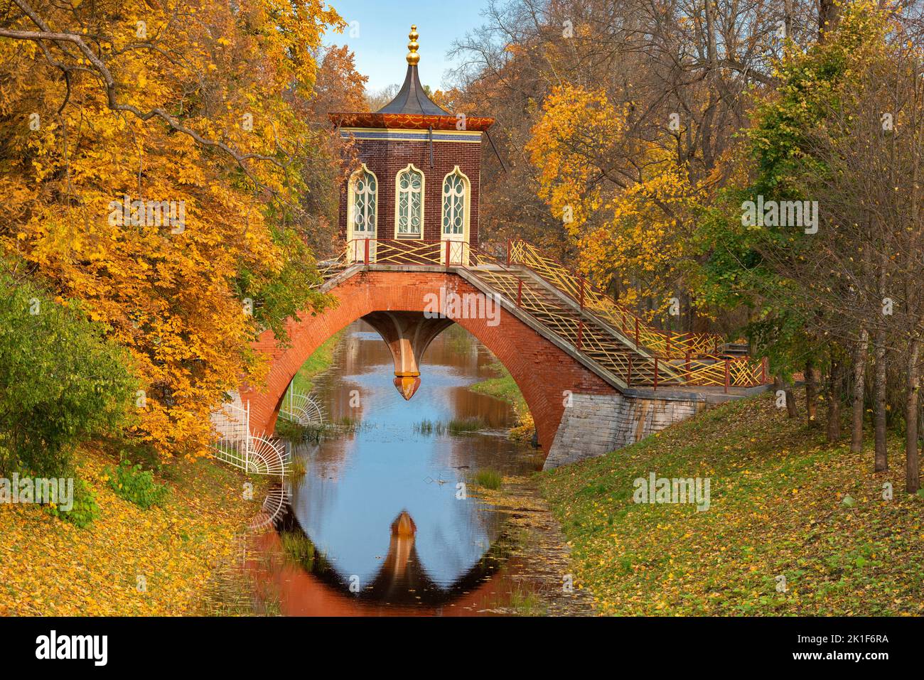 Old Cross bridge in autumn landscape. Tsarskoye Selo, St. Petersburg. Russia Stock Photo
