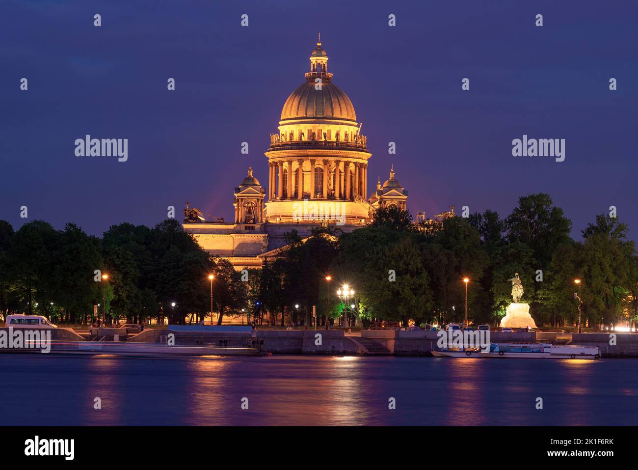View of St. Isaac's Cathedral from the side of the Neva river on May night. Saint-Petersburg, Russia Stock Photo