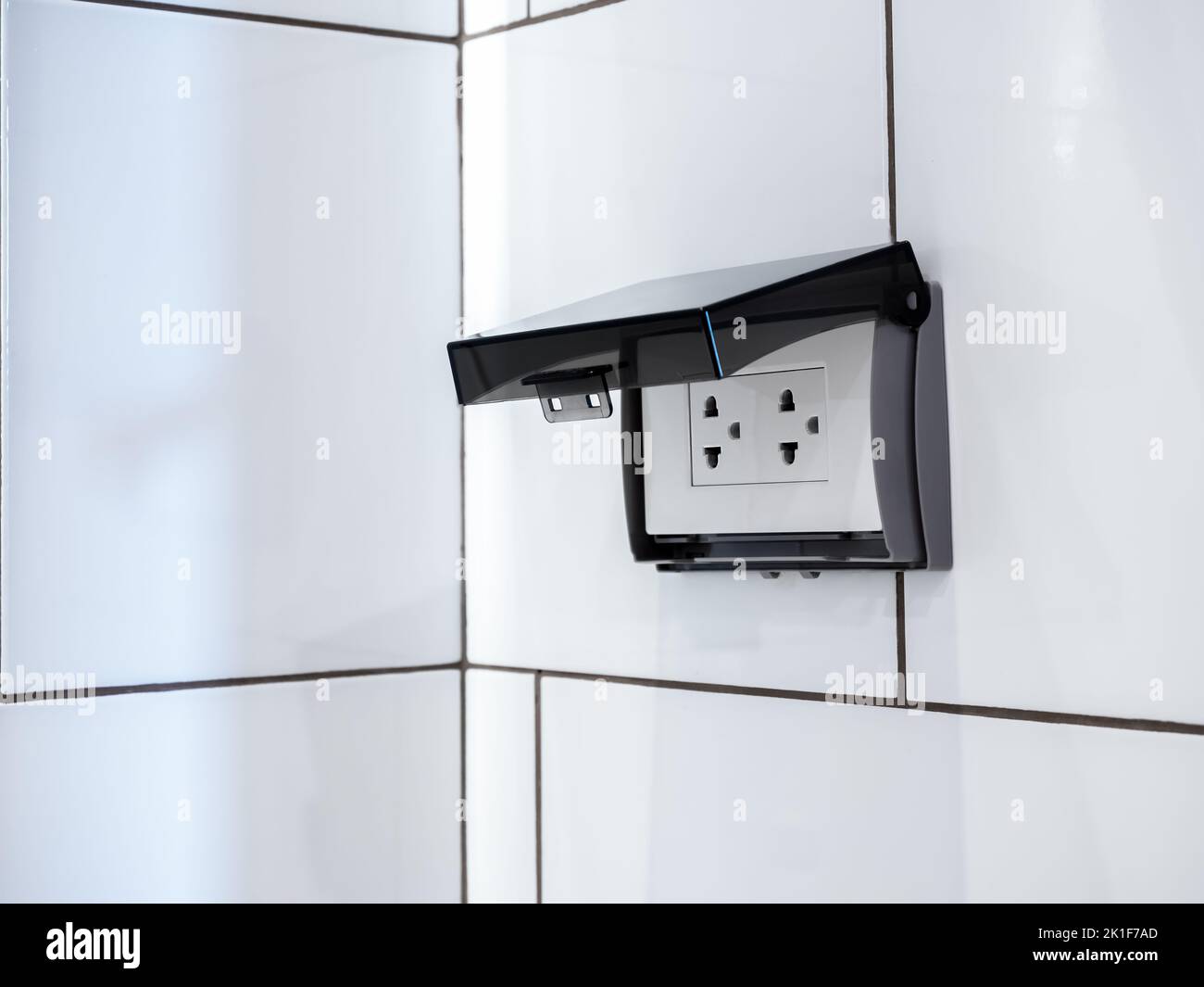 Closeup empty white electrical plug socket plate panel with