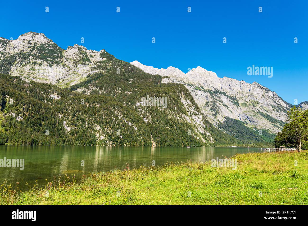 Lake Koenigssee with rocks and trees in the Berchtesgaden Alps, Germany. Stock Photo