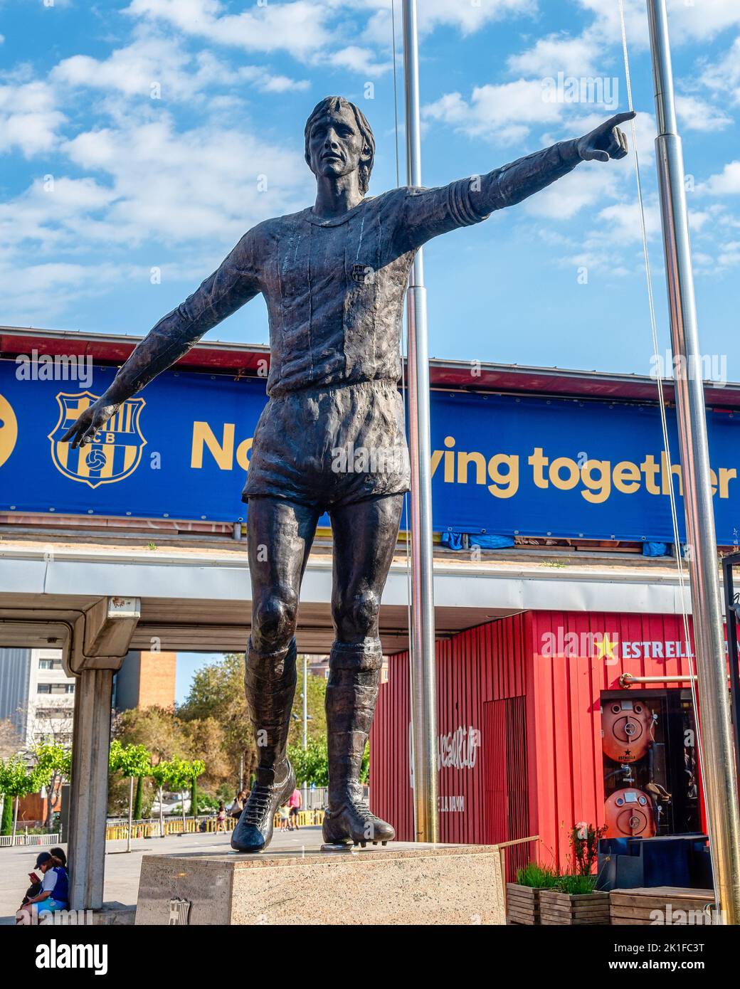 A sculpture or statue of Johan Cruyff in the exterior area ...