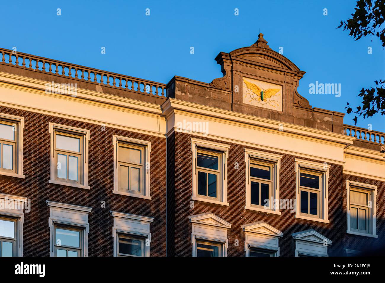 Old building facade in late sun, Utrecht, the Netherlands Stock Photo