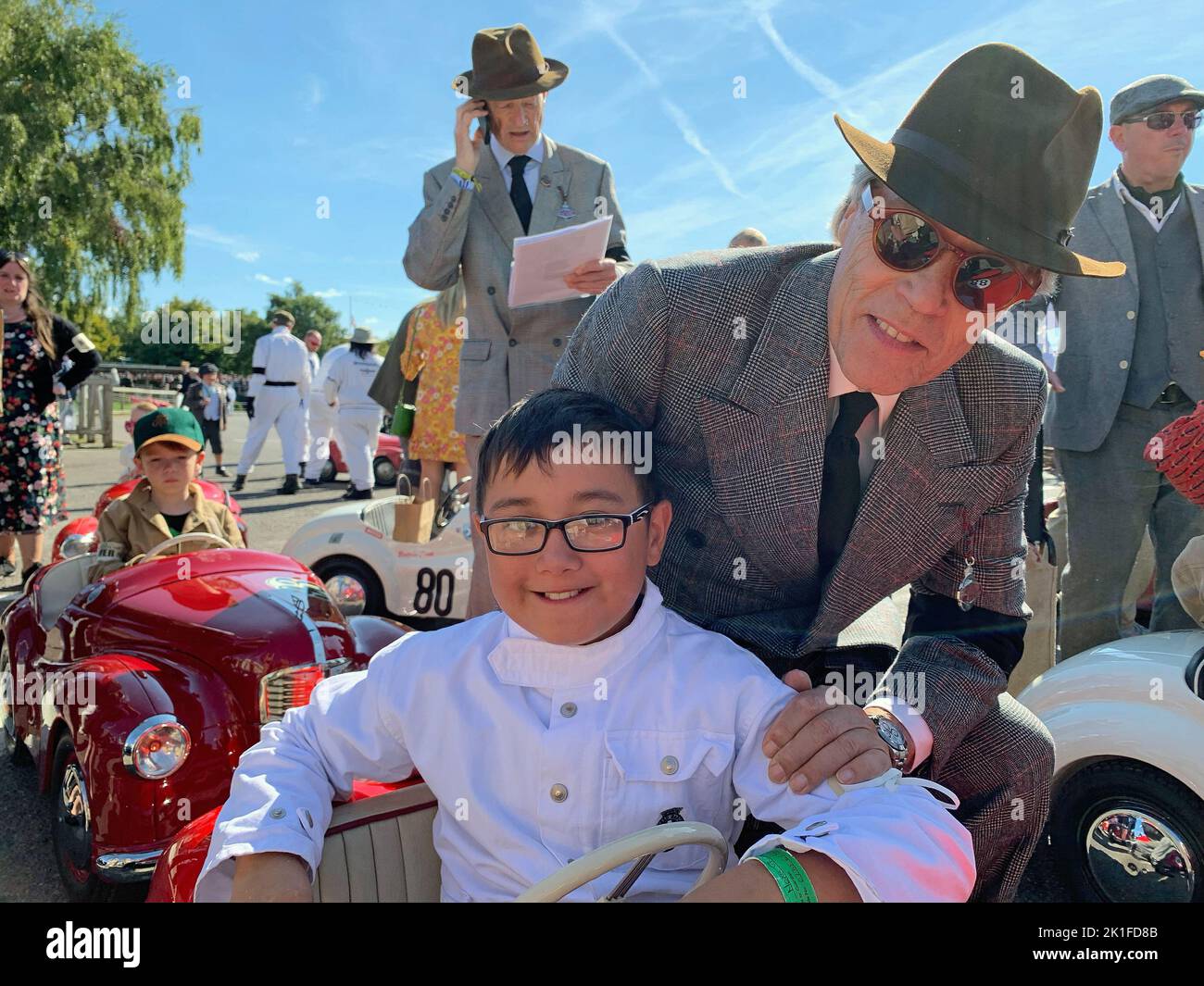 Goodwood, West Sussex, UK. 18th September 2022. His Grace the Duke of Richmond and Gordon with Settrington Cup Austin J40 pedal car race driver Joshua Greig at the Goodwood Revival in Goodwood, West Sussex, UK. © Malcolm Greig/Alamy Live News Stock Photo