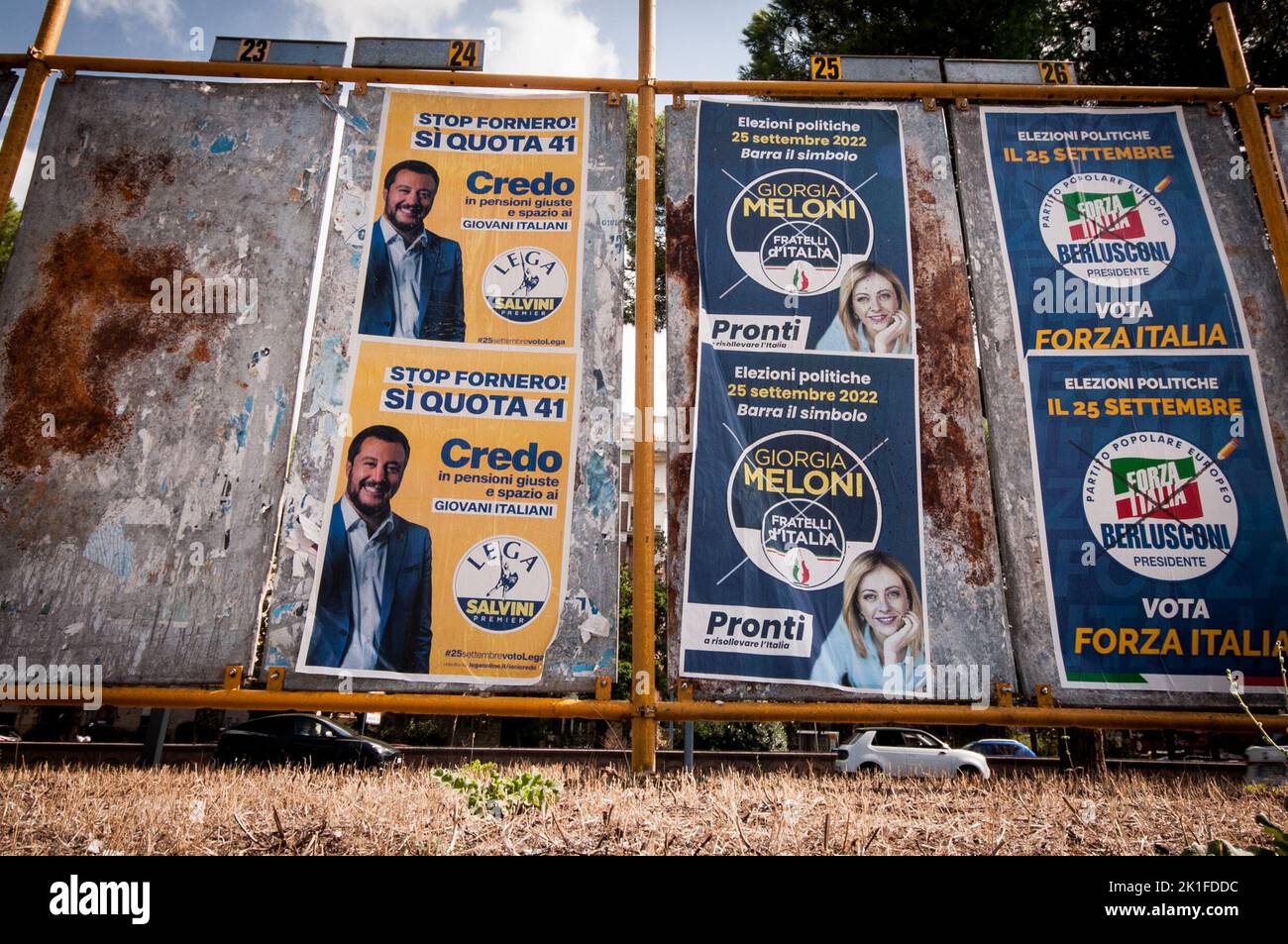 ROME, ITALY - SEPTEMBER 17, 2022 ROME, ITALY - SEPTEMBER 17, 2022  The electoral poster of Matteo Salvini, leader of the Lega party, and the electoral poster of Giorgia Meloni, leader of the Fratelli d'Italia party leaders ,and poster  Forza Italia political party ahead of the upcoming September 25 general elections for the renewal of the Chamber of Deputies and the Senate of the Republic on September 17, 2022 in Rome. On September 25, 2022, voters will elect all members of the two chambers of the Italian parliament. After a constitutional referendum, the size of the chambers will be halved, t Stock Photo