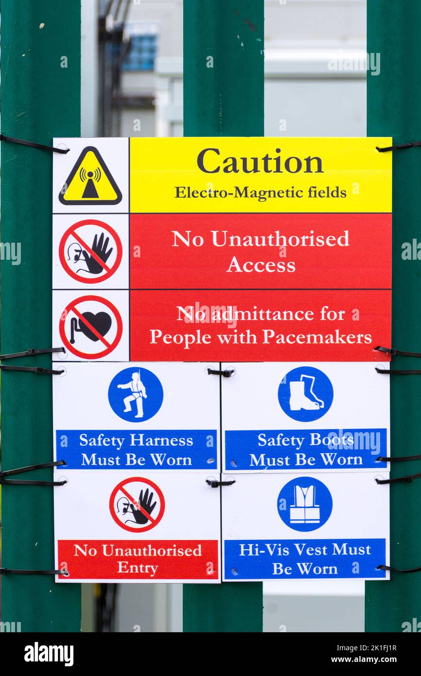 Warning sign. Caution Electro fields. Mobile phone mast in