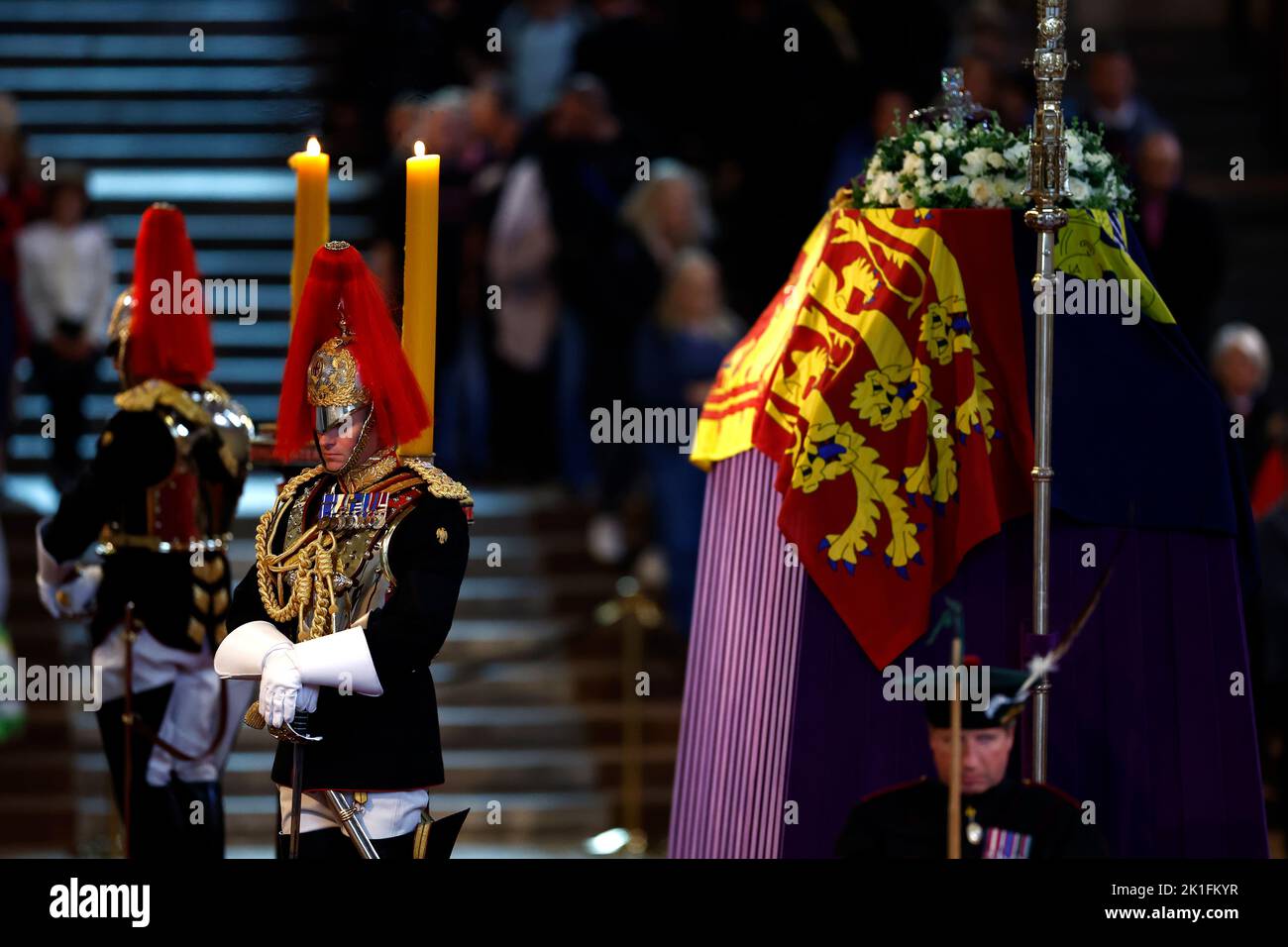 Household Cavalry, Blues and Royals stand guard where Queen Elizabeth II's flag-draped coffin is lying in state on the catafalque at Westminster Hall, London, ahead of her funeral on Monday. Picture date: Sunday September 18, 2022. Stock Photo
