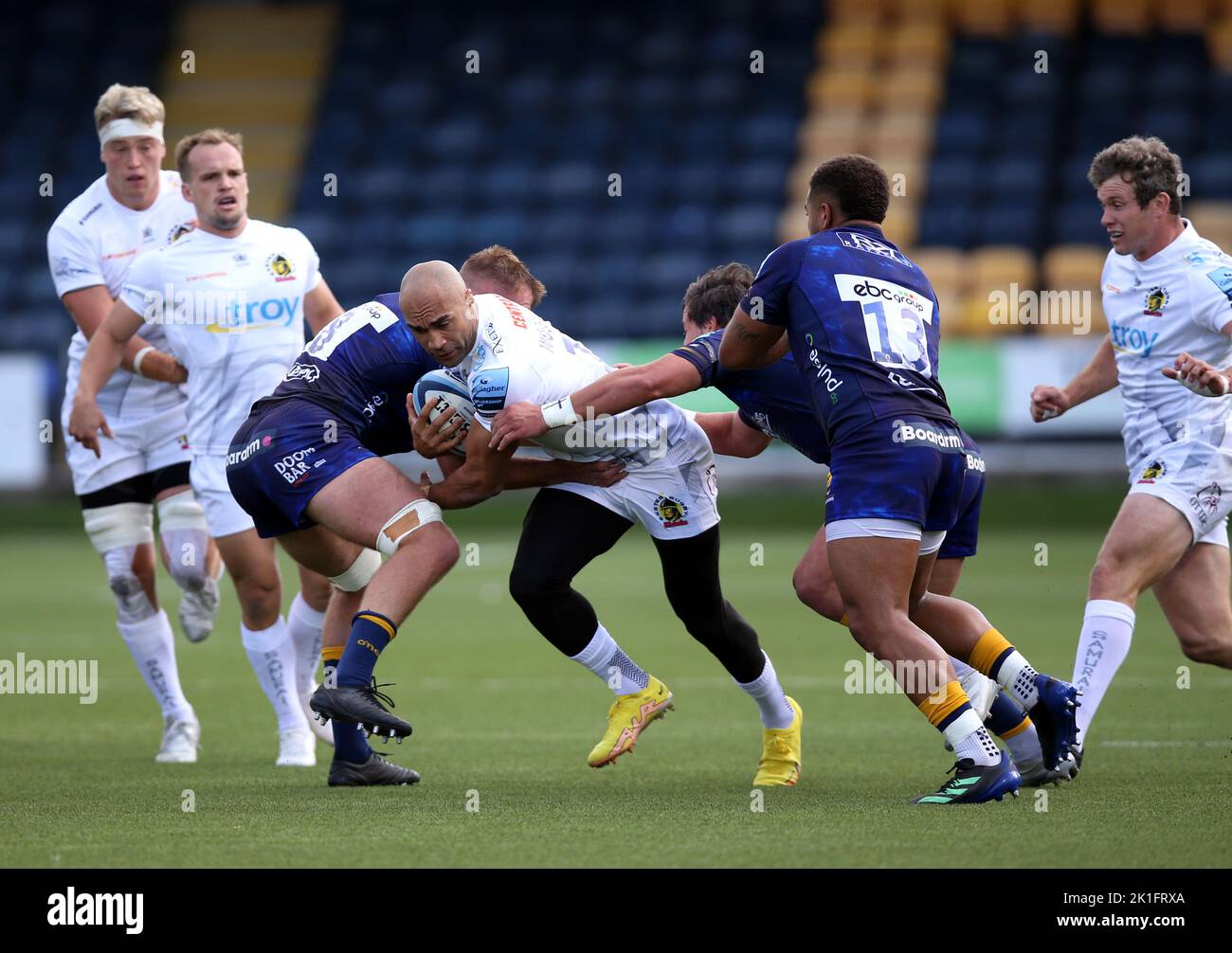 Exeter Chiefs' Olly Woodburn (centre) tackled by Worcester Warriors' Tom Dodd and Ollie Lawrence during the Gallagher Premiership match at Sixways Stadium, Worcester. Picture date: Sunday September 18, 2022. Stock Photo
