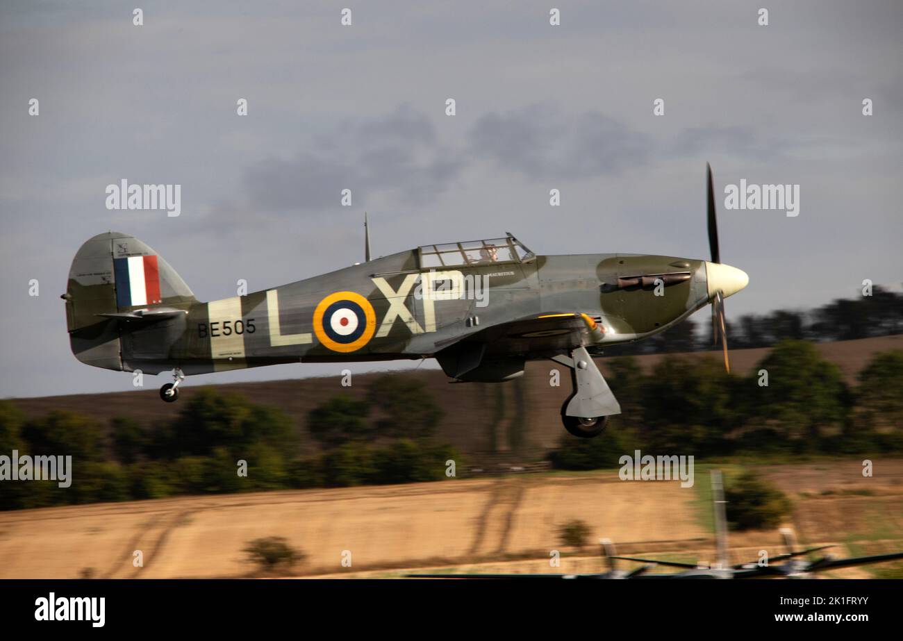 Hawker Hurricane Mk.IIb 'Pegs' BE505, G-HHII landing at dusk, after it's flying display at the IWM Duxford Battle of Britain Airxshow 10th September Stock Photo