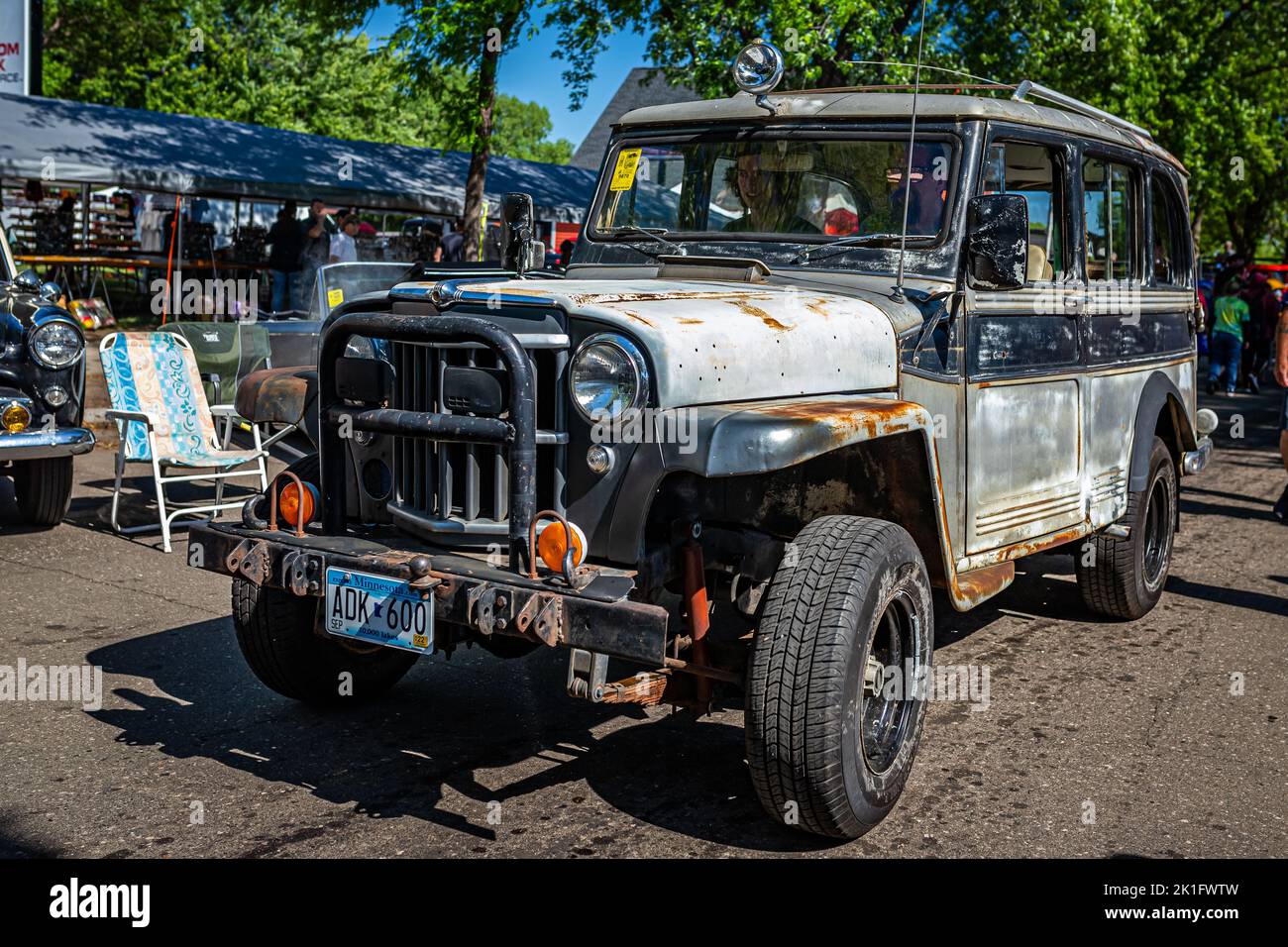 Falcon Heights, MN - June 18, 2022: High perspective front corner view of a 1957 Willys Jeep Utility Wagon at a local car show. Stock Photo