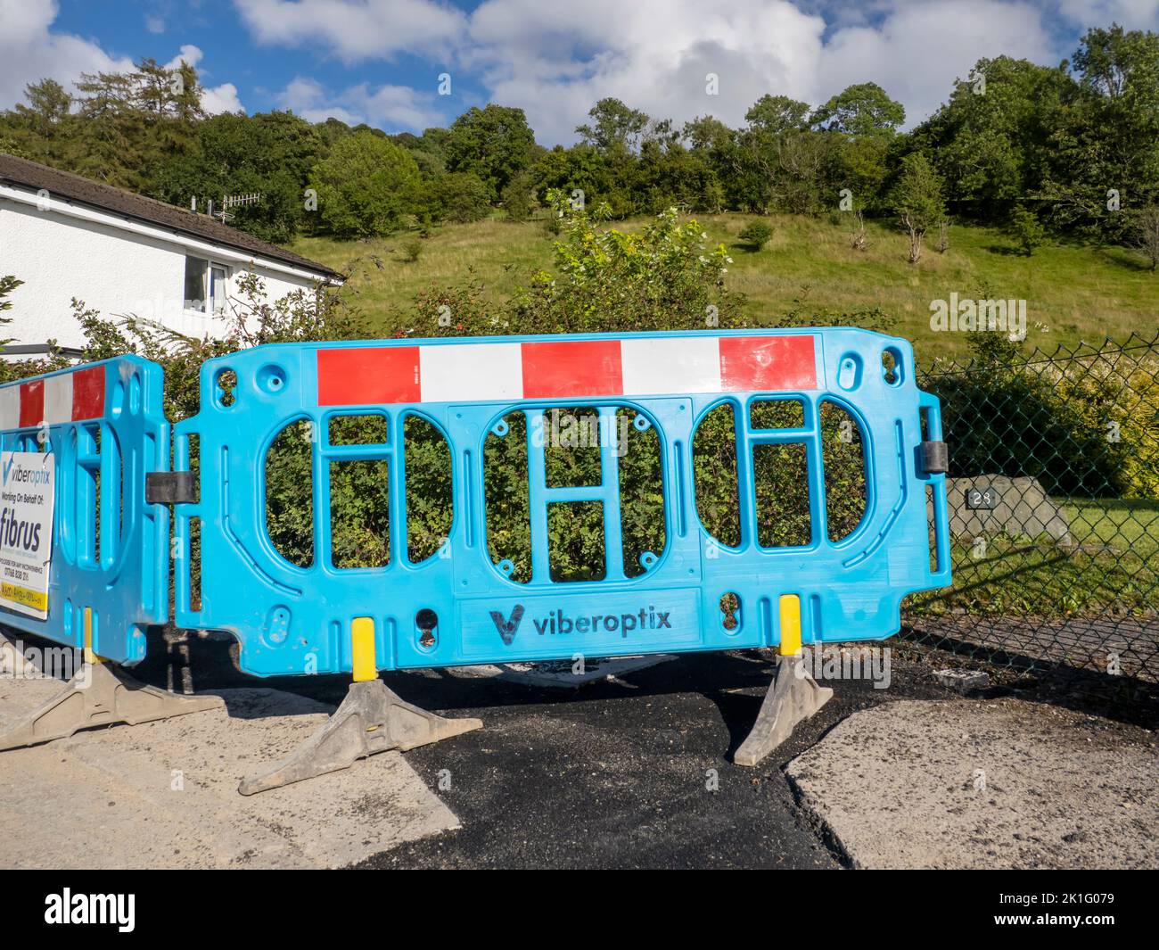 Construction work to install fibre optic broadband to a street in Ambleside, Lake District, UK. Stock Photo