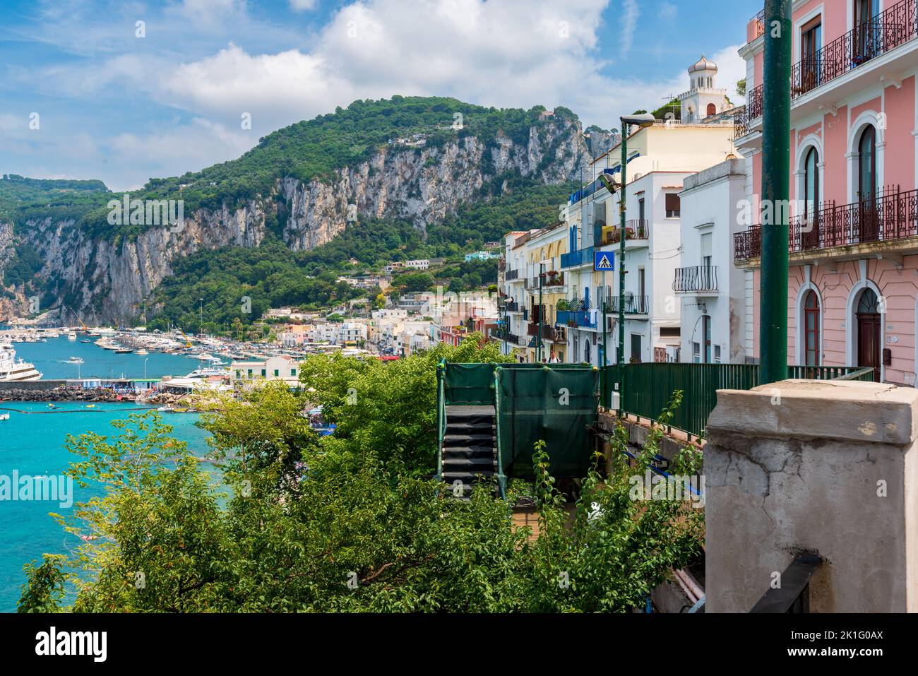 View of a island village with mountains in the background Stock Photo