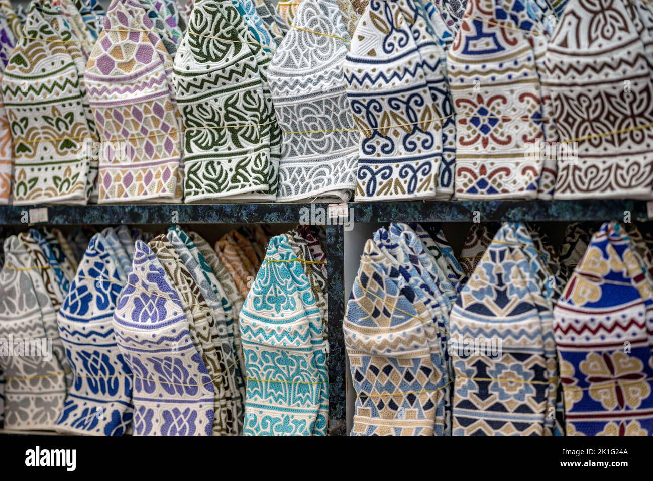 Windows full of kuma (traditional Omani hat) on sal,e Muttrah Souq, Muscat, Oman Stock Photo