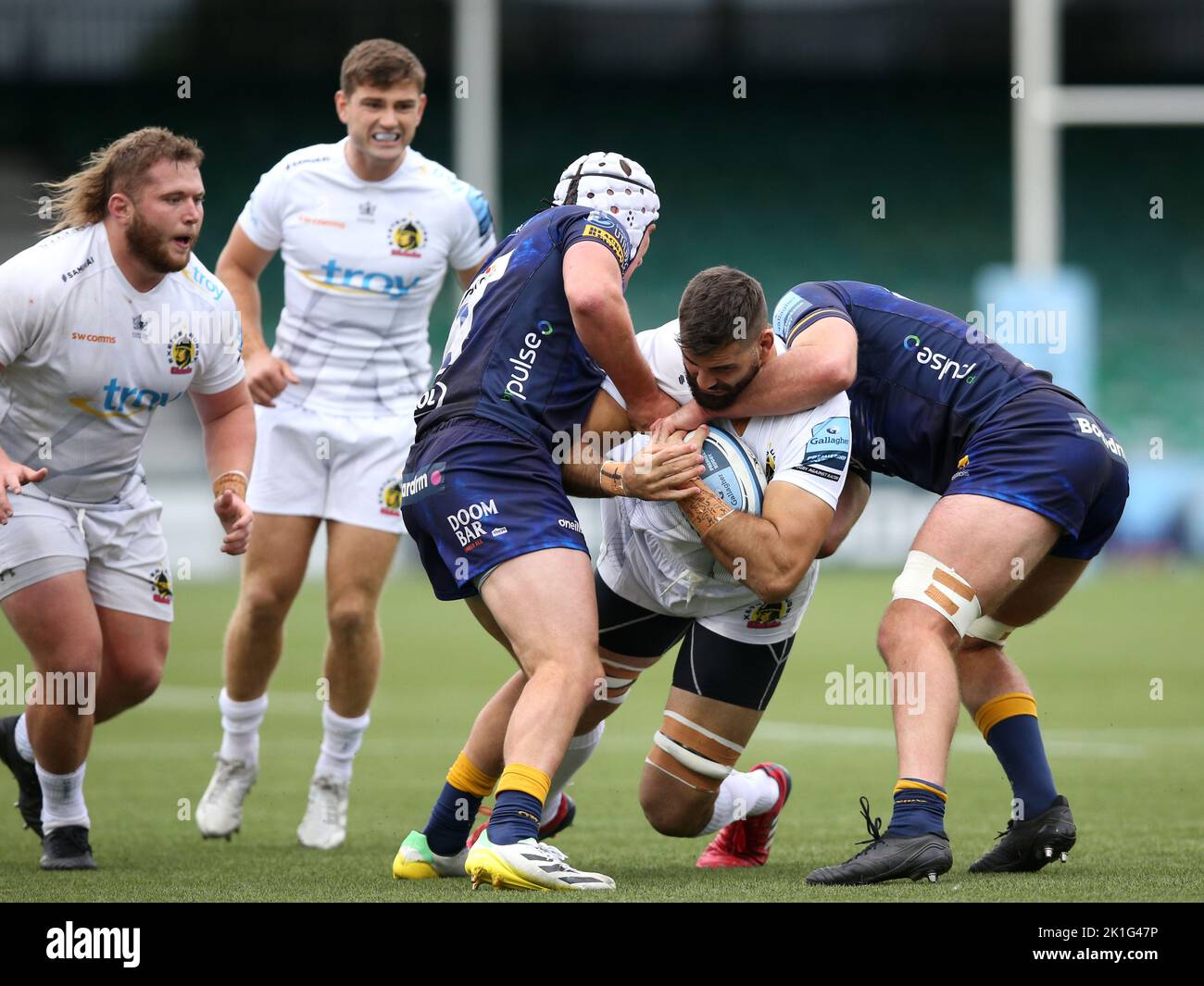 Exeter Chiefs' Ruben van Heerden tackled by Worcester Warriors' Curtis Langdon and Tom Dodd during the Gallagher Premiership match at Sixways Stadium, Worcester. Picture date: Sunday September 18, 2022. Stock Photo