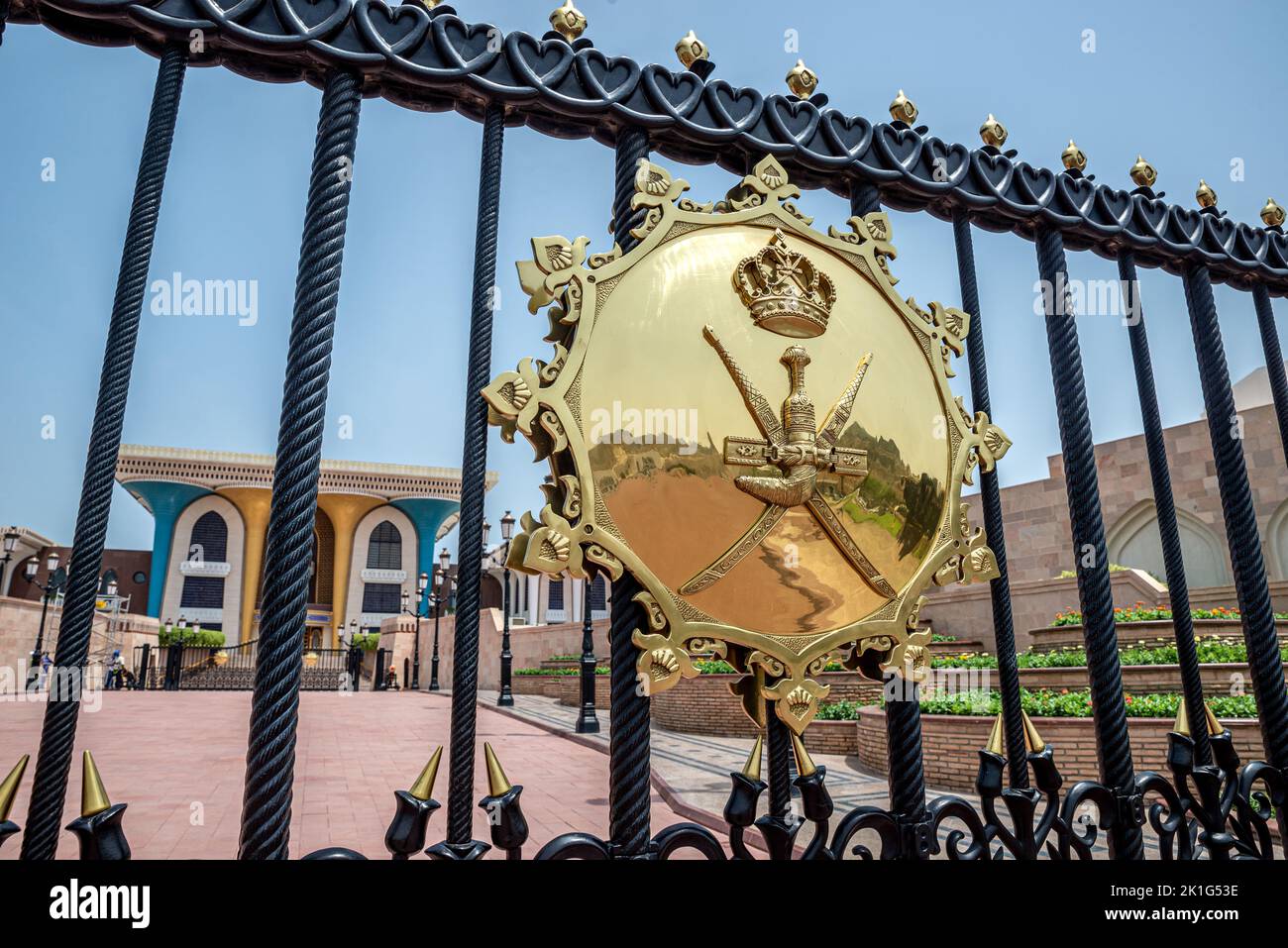 Golden coat of arms on the gate of Al Alam Royal Palace, Old Muscat