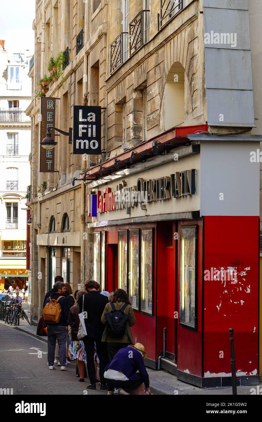 People in line outside the cinema Filmothèque du Quartier Latin, rue Champollion, 5th Arrondissement, Paris, France. Stock Photo