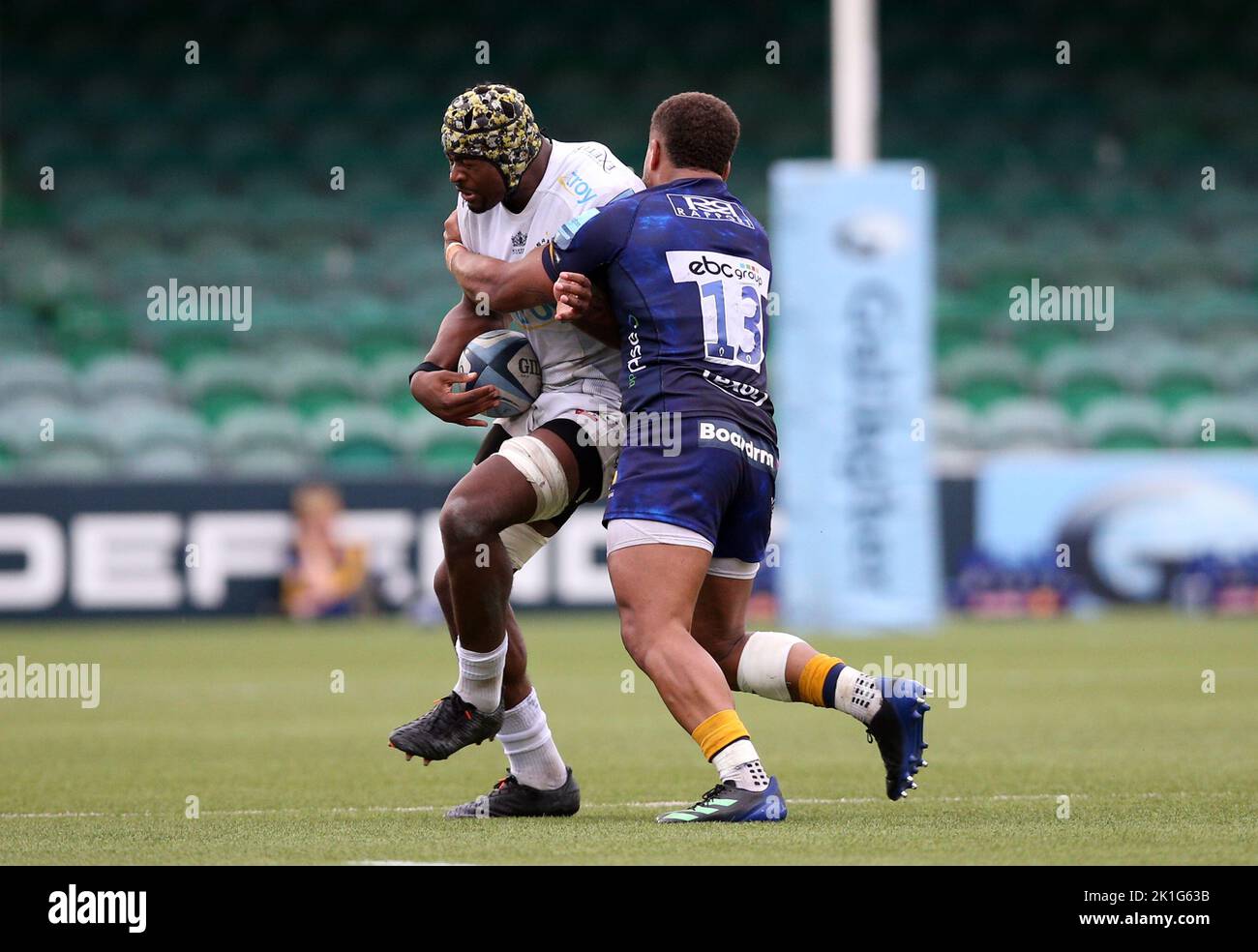 Exeter Chiefs' Christ Tshiunza tackled by Worcester Warriors' Ollie Lawrence during the Gallagher Premiership match at Sixways Stadium, Worcester. Picture date: Sunday September 18, 2022. Stock Photo