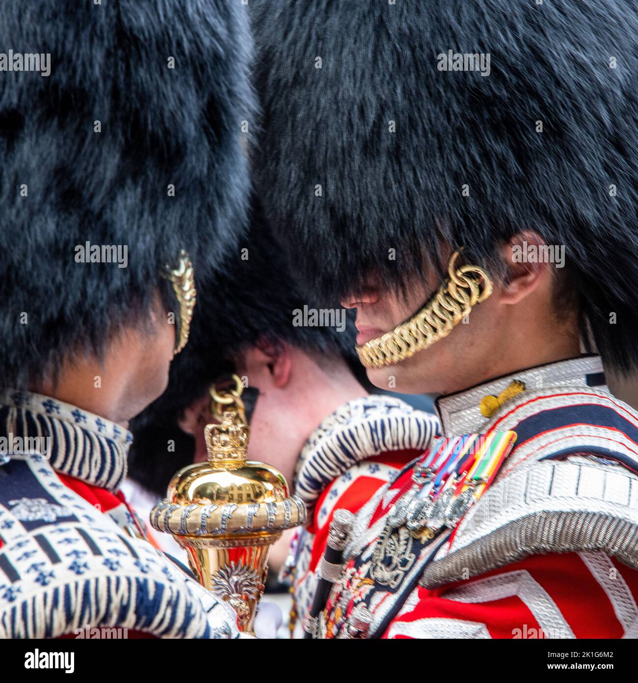 Part view of honor's foot guard with black feathered bonnet and decorations Stock Photo