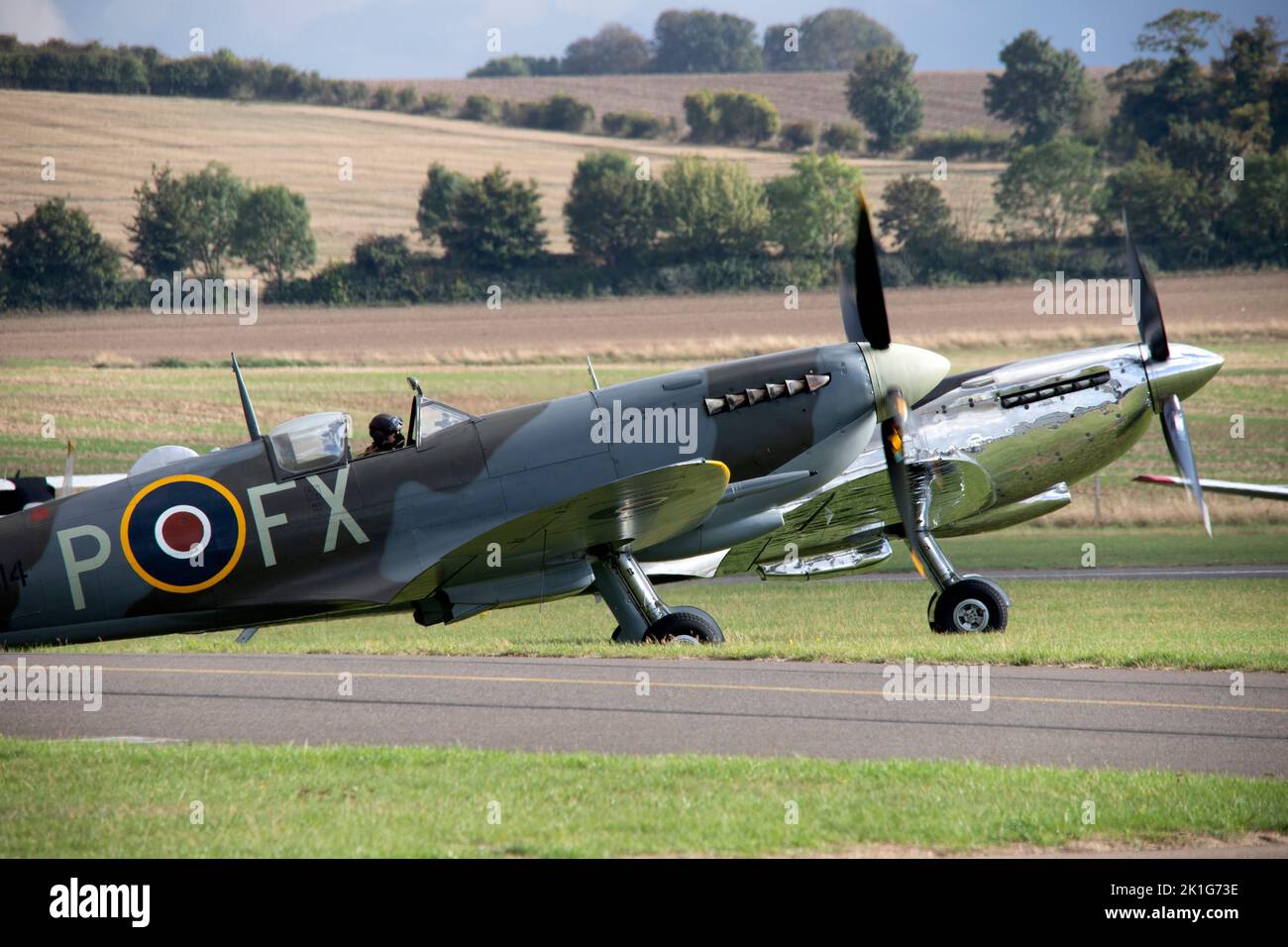 Supermarine Spitfires taking off to form the big wing flying display at the IWM Duxford Battle of Britain Airshow 10th September 2022 Stock Photo