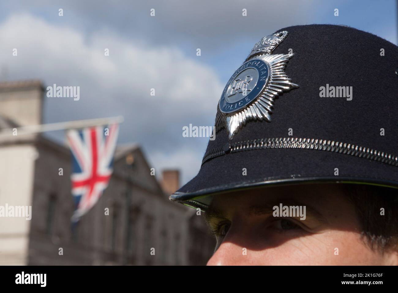 London, UK, 18 September 2022: Crowds fill the streets of Whitehall to pay their respects to the late monarch Queen Elizabeth II, whose funeral takes place tomorrow. The event is the biggest police operation the country has seen with officers from all around the country providing extra support to the Met. Their helmets will soon have to have new badges which will say CR III. Anna Watson/Alamy Live News Stock Photo