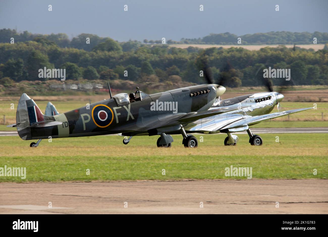 Supermarine Spitfires taking off to form the big wing flying display at the IWM Duxford Battle of Britain Airshow 10th September 2022 Stock Photo