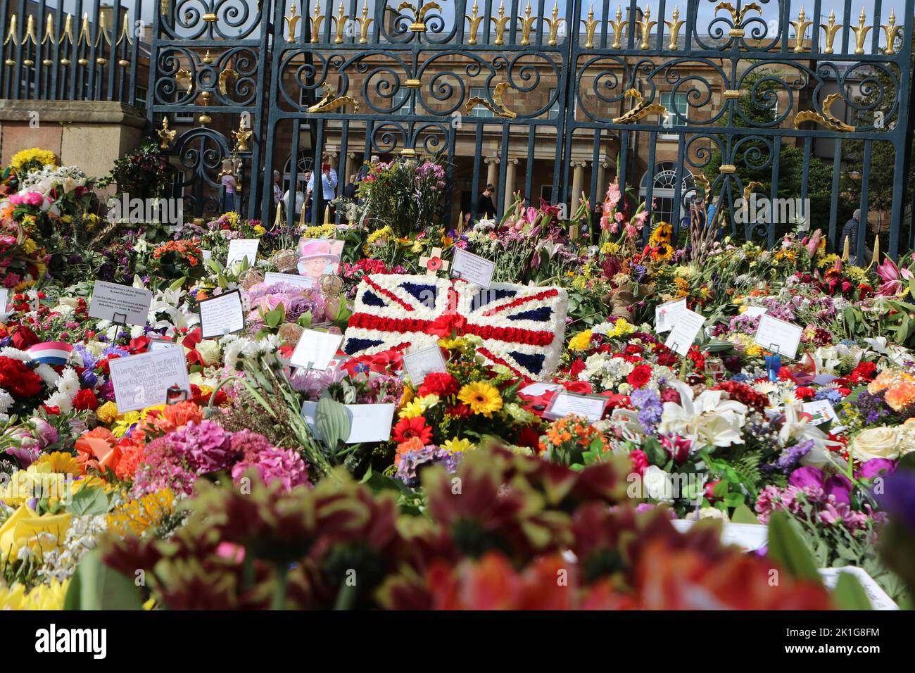 Union Jack made of flowers laid outside Hillsborough Castle, Royal