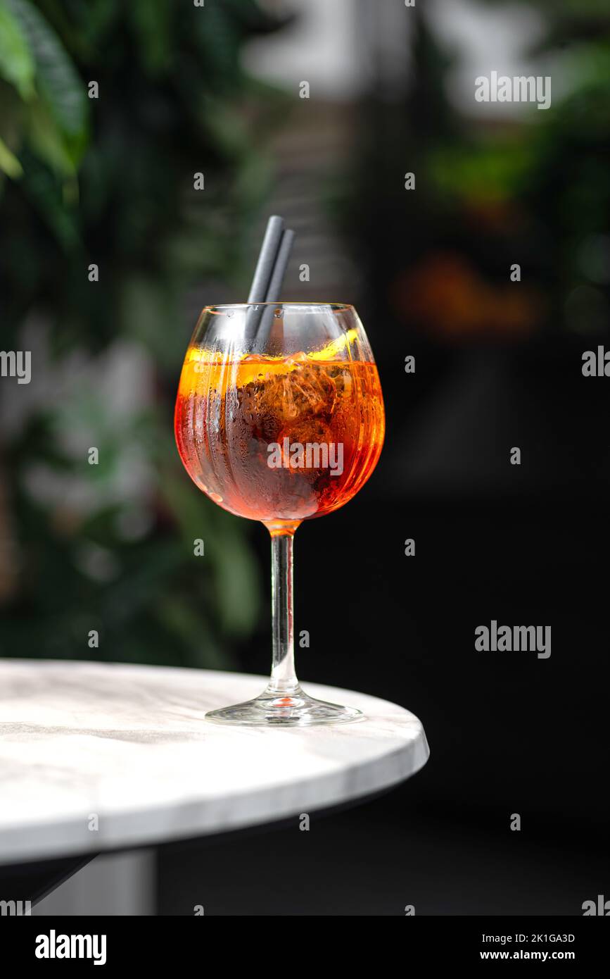 Classic cocktail Americano with campari, soda with ice.Traditional