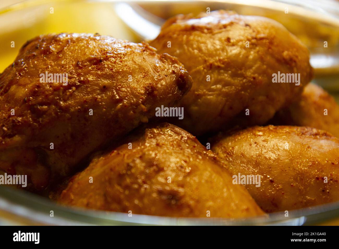 Fried appetizing pieces of chicken meat close-up. Stock Photo