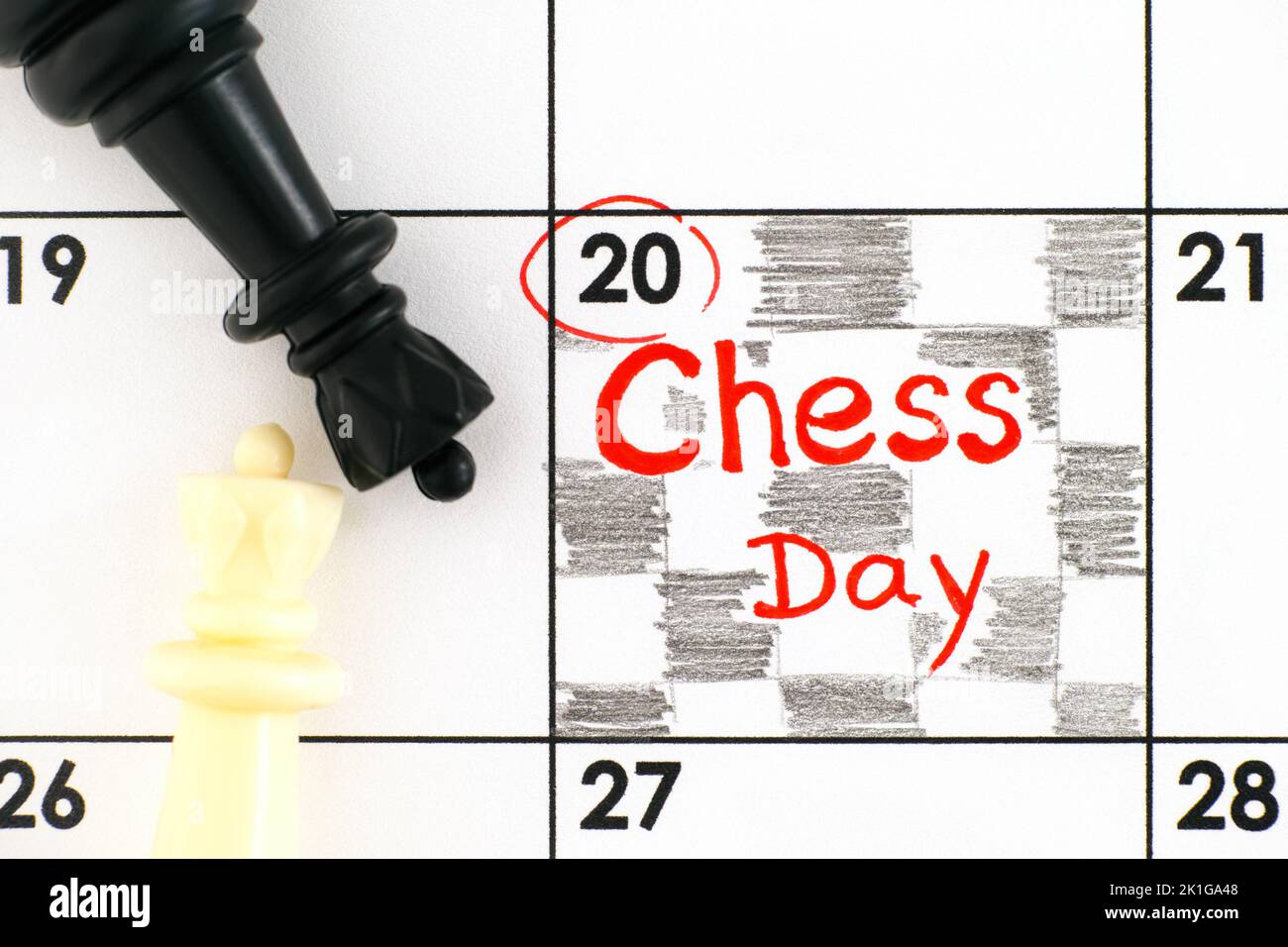 A Reminder Chess Day in the calendar with black and white chess pieces on it. July 20. Stock Photo