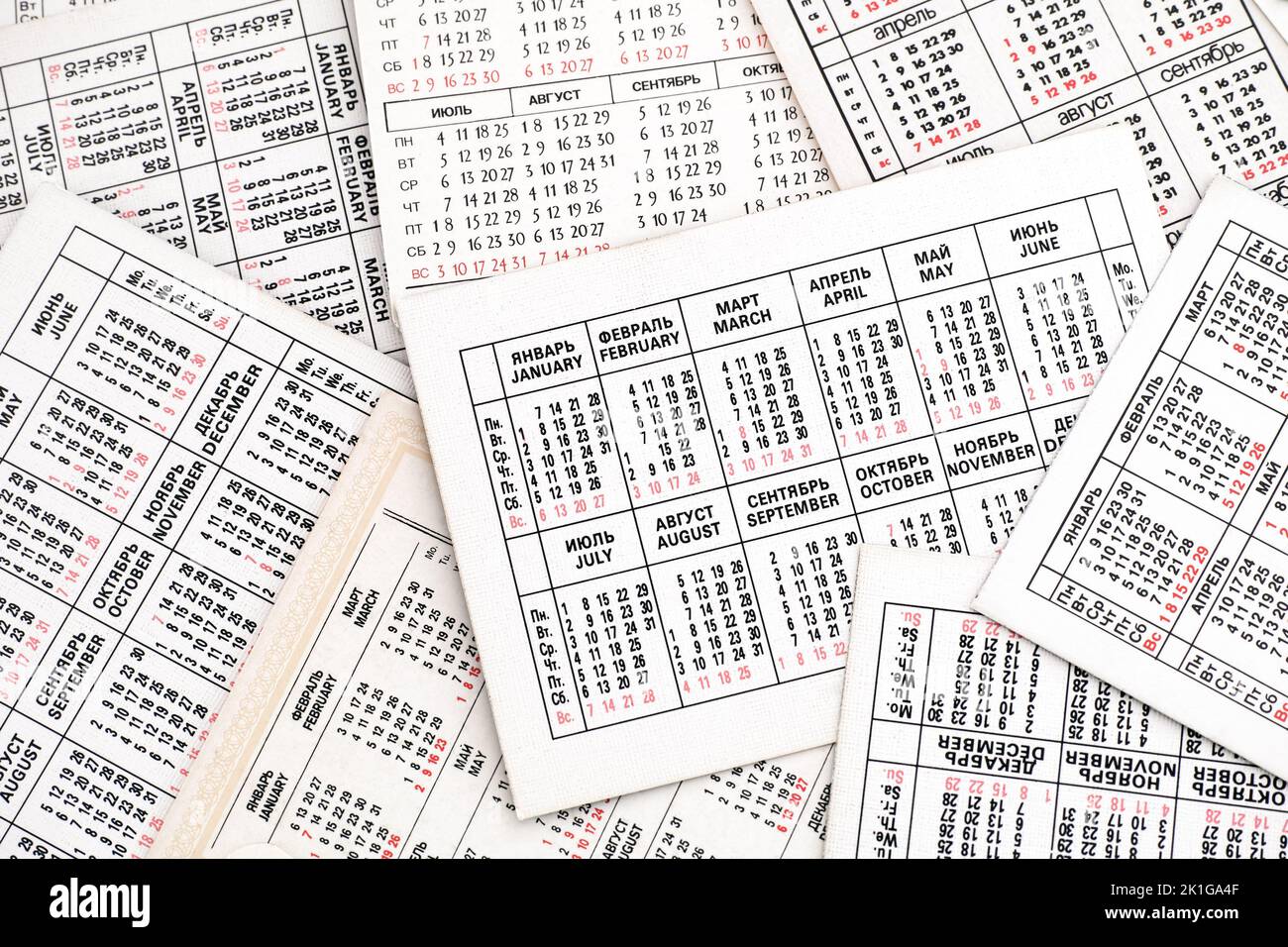 A lot of old small pocket calendars background. Stock Photo