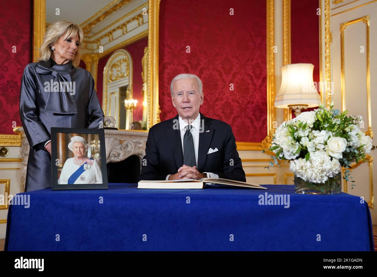 U.S. President Joe Biden and first lady Jill Biden prepare to sign a condolence book for Britain's Queen Elizabeth, following her death, at Lancaster House in London, Britain, September 18, 2022. REUTERS/Kevin Lamarque Stock Photo