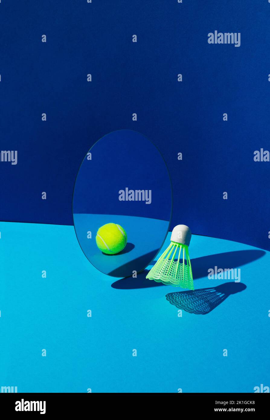 Badminton shuttlecock or birdie reflecting in mirror as tennis ball on
