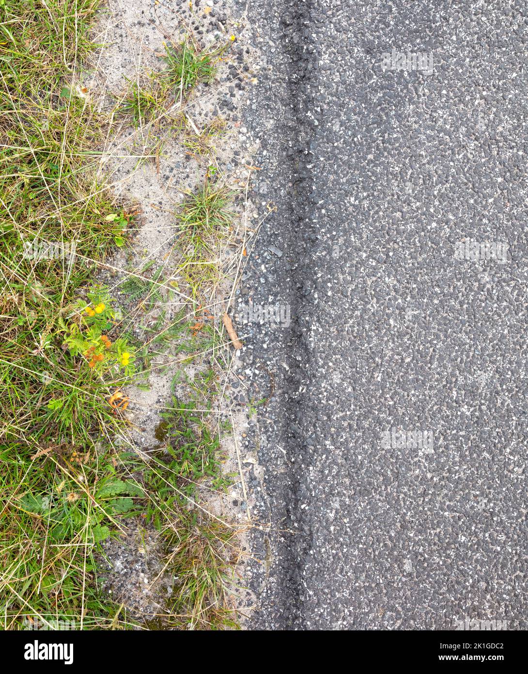 Side of an asphalt road, litteraly the end of the road Stock Photo