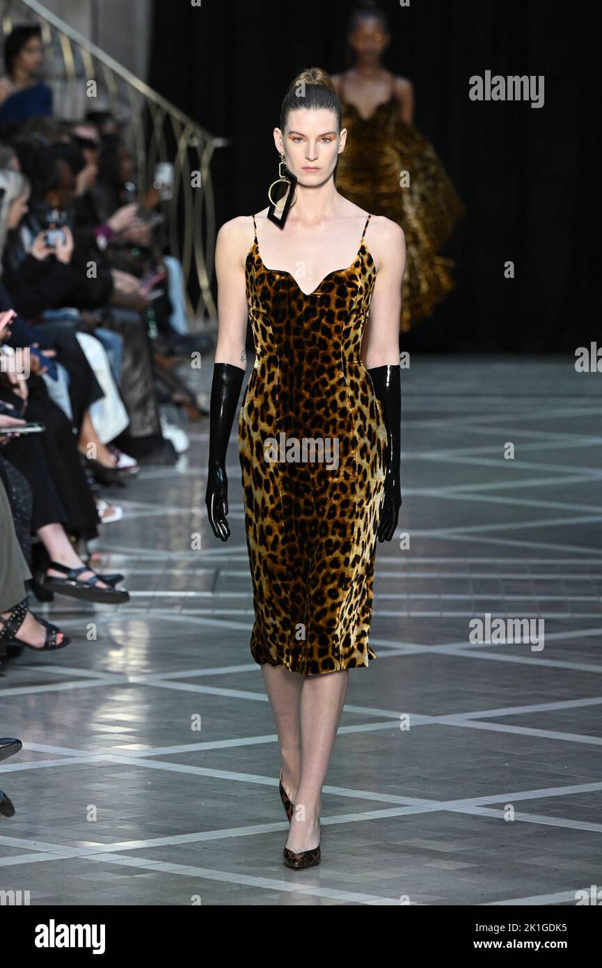 A model walks on the runway at the Halpern fashion show during the