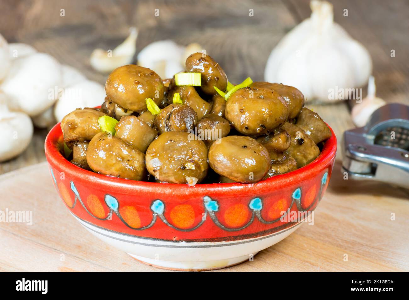 Vegan glazed button mushrooms with vegan butter, garlic in soy sauce